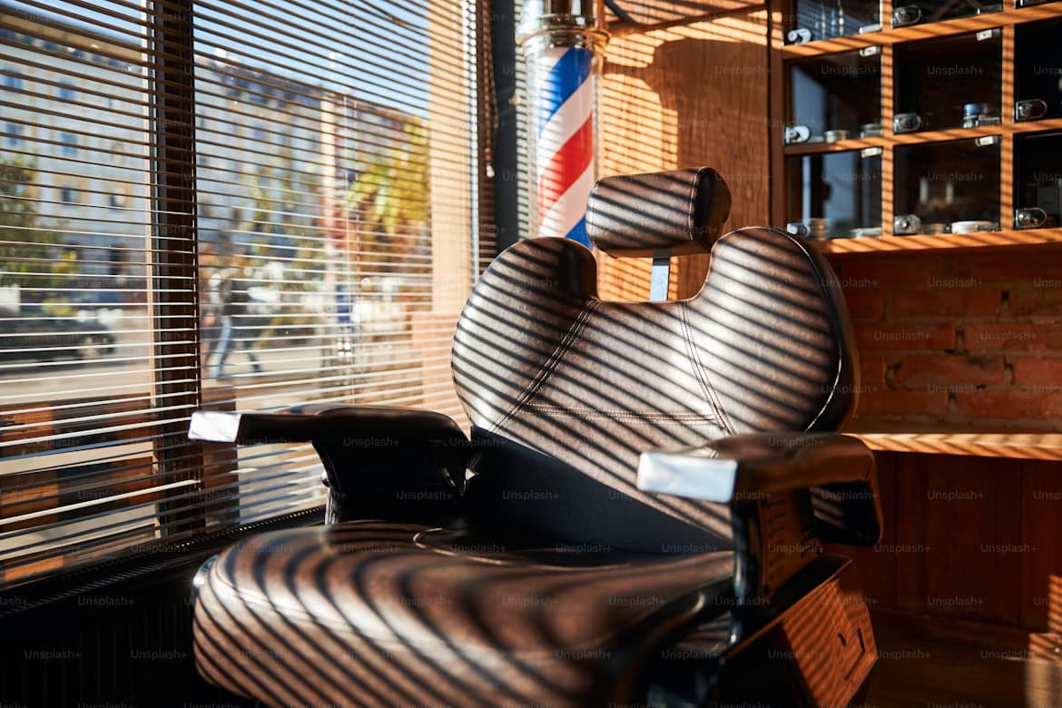 An empty barber's chair.